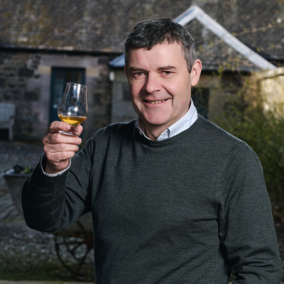 Euan mitchell 2025 headshot %288%29 listing rebrand